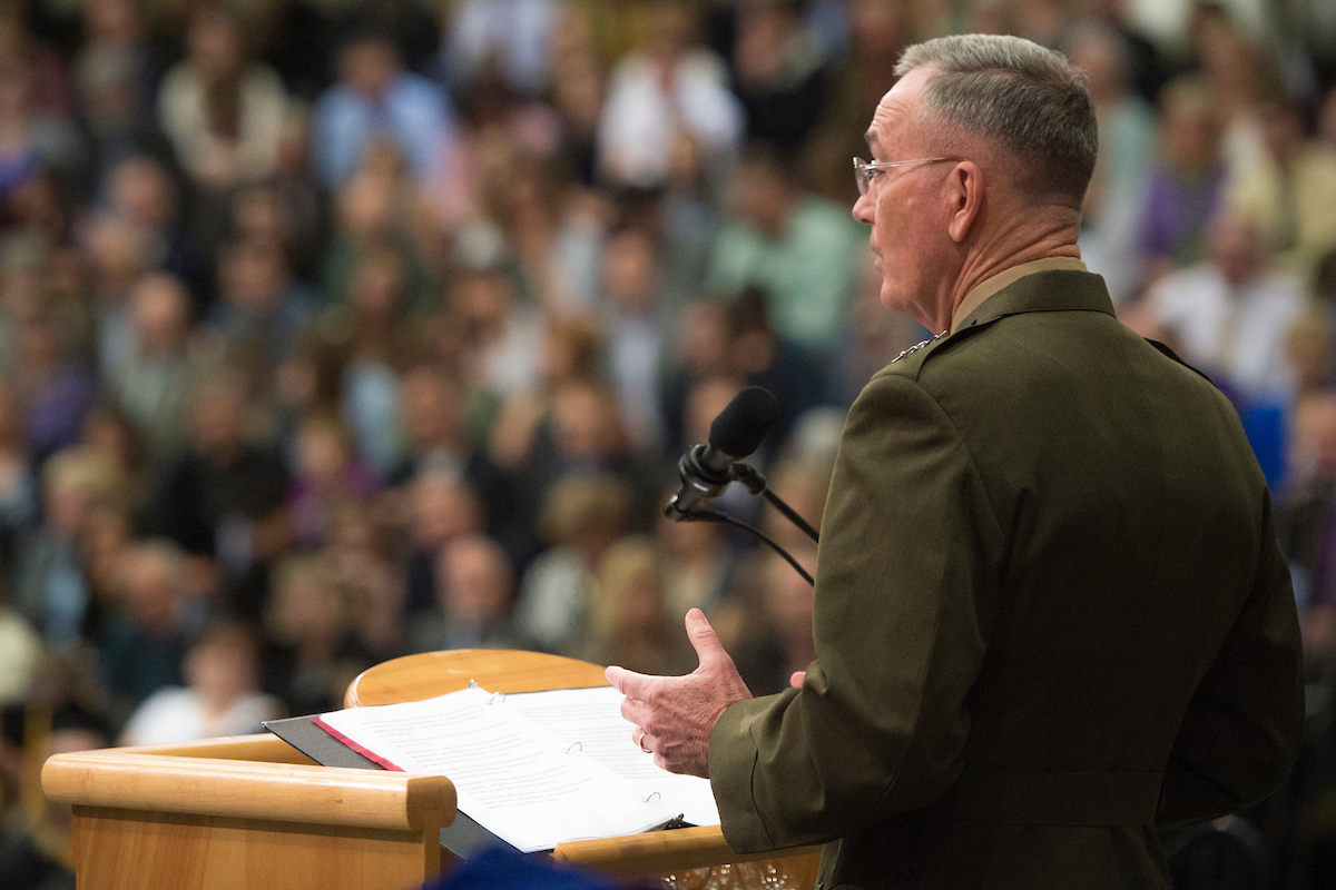 Gen. Joseph F. Dunford Jr stands speaking to Commencement guests