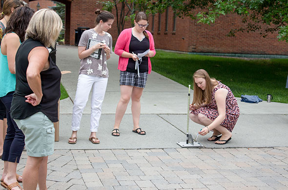 Students experiment during a Graduate Education course over the summer at Saint Michael's College.