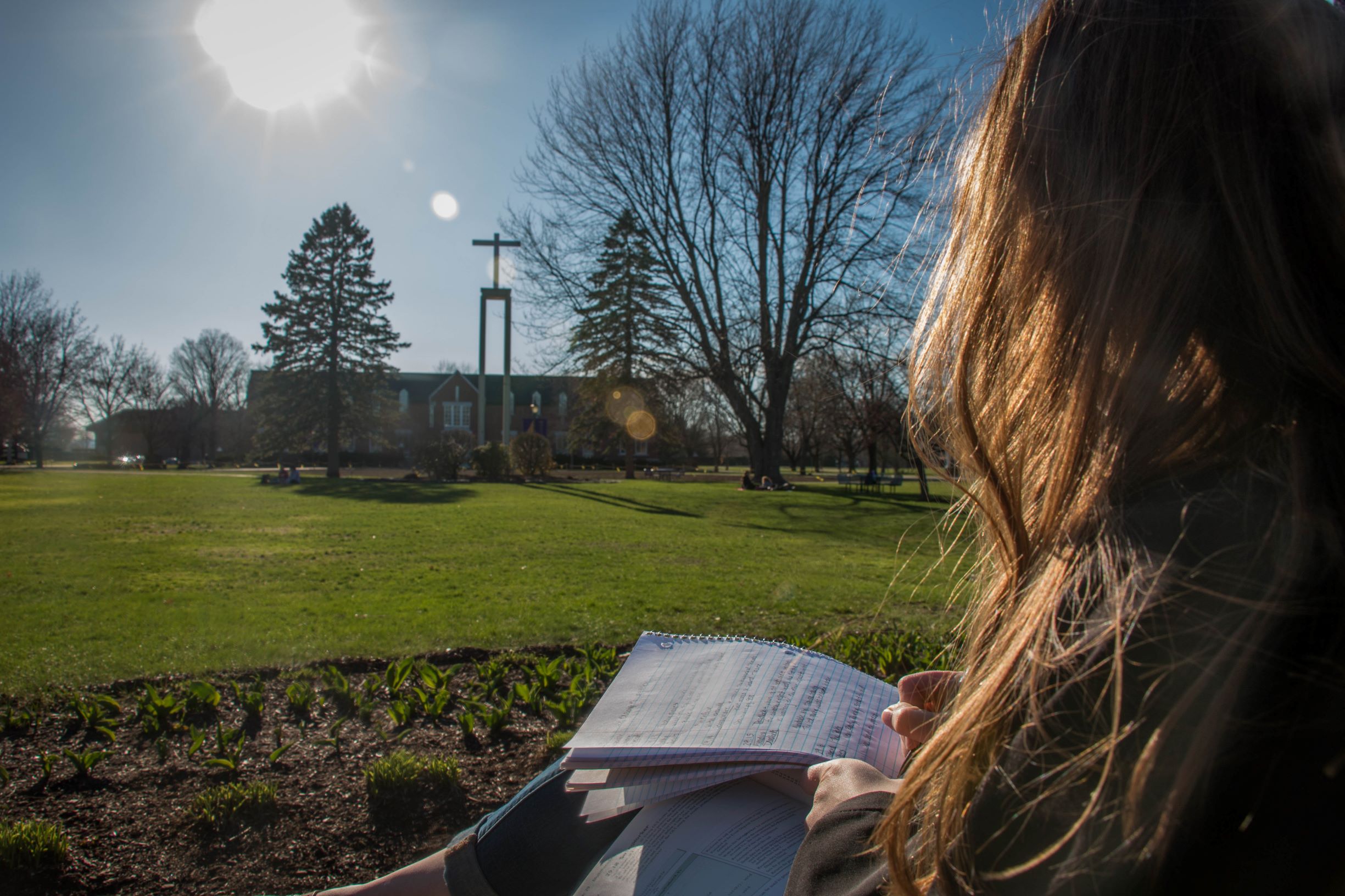 Student Studying outside at Saint Michael's College