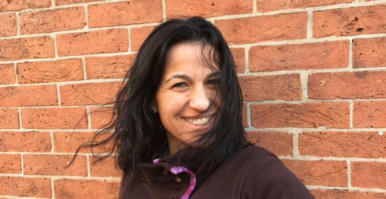 A headshot of Holly Leon-Lierman.