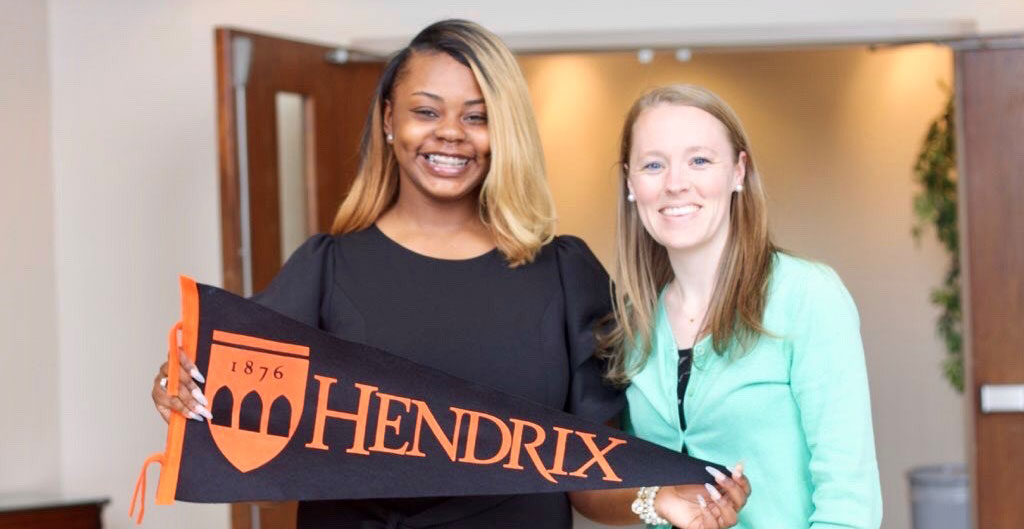 A photo of Sarah Dewey and a friend.