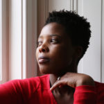 person dressed in red headshot