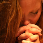 person praying