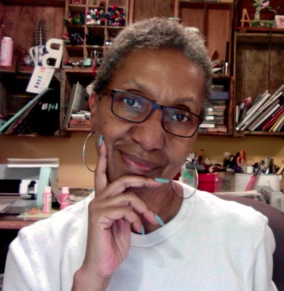 A headshot of Billie Miles.