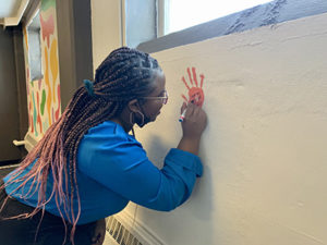 Resident Assistant’s  ‘Murals’ project brightens Alumni basement