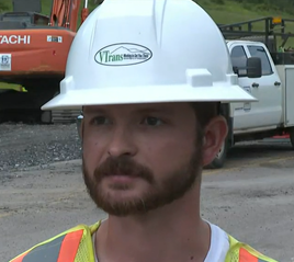 A headshot of Joshua Paquette.